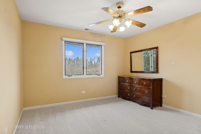 bedroom featuring ceiling fan and light carpet