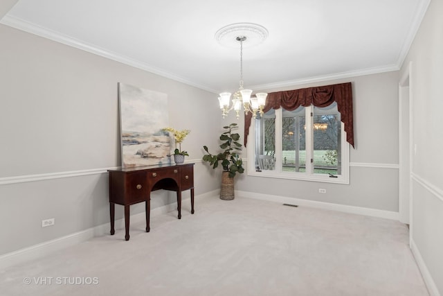 misc room with ornamental molding, light colored carpet, and a chandelier