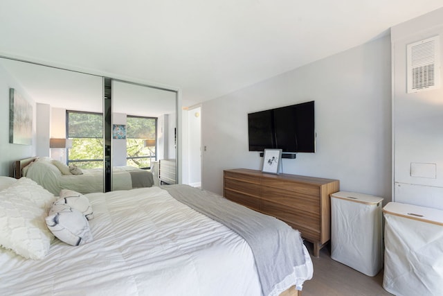 bedroom featuring hardwood / wood-style flooring