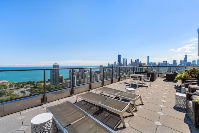 view of patio / terrace with a water view