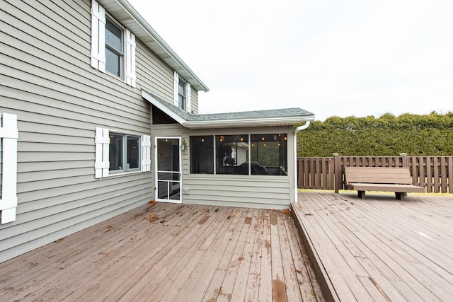 wooden terrace with a sunroom