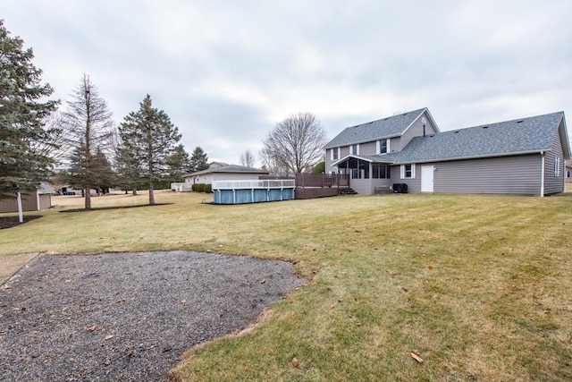 view of yard featuring a sunroom