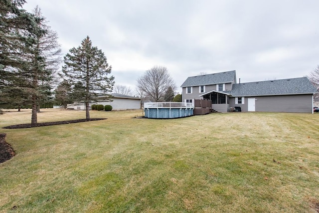 view of yard with a sunroom