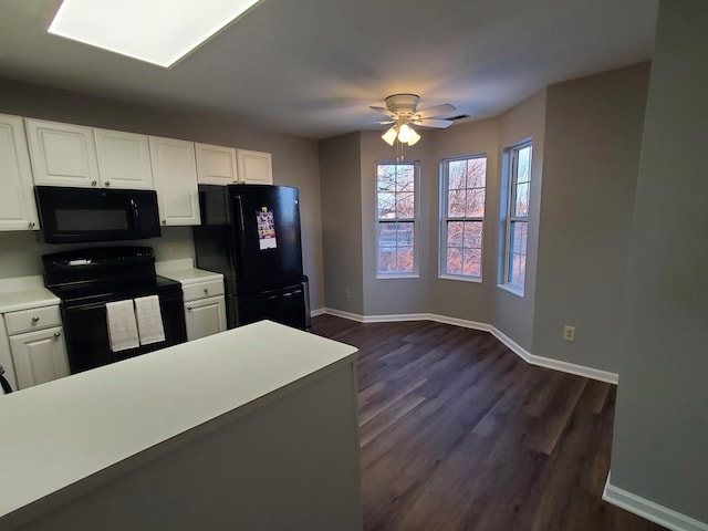 kitchen with dark hardwood / wood-style floors, white cabinets, ceiling fan, and black appliances