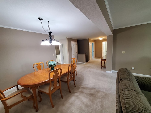 carpeted dining area featuring a notable chandelier and ornamental molding