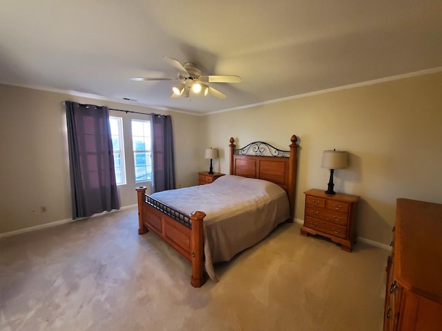 bedroom featuring light carpet, ornamental molding, and ceiling fan