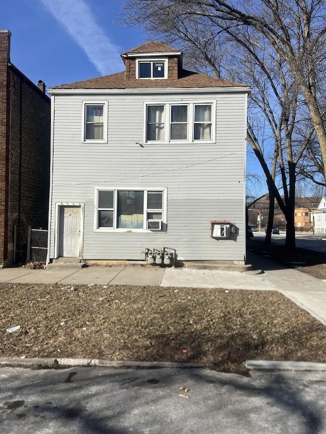 front facade featuring cooling unit