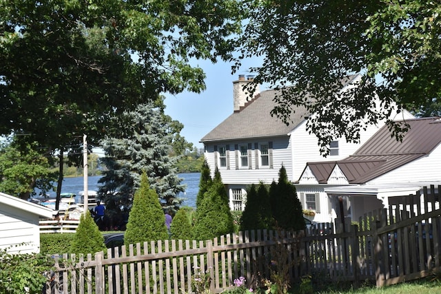 view of side of property featuring a water view