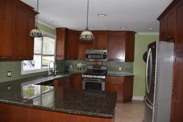 kitchen with sink, decorative light fixtures, dark stone countertops, kitchen peninsula, and stainless steel appliances