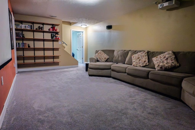 living room with carpet flooring and a textured ceiling