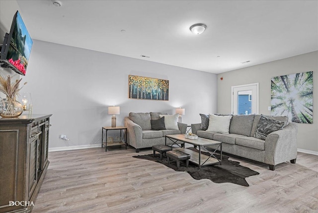 living room featuring light hardwood / wood-style floors