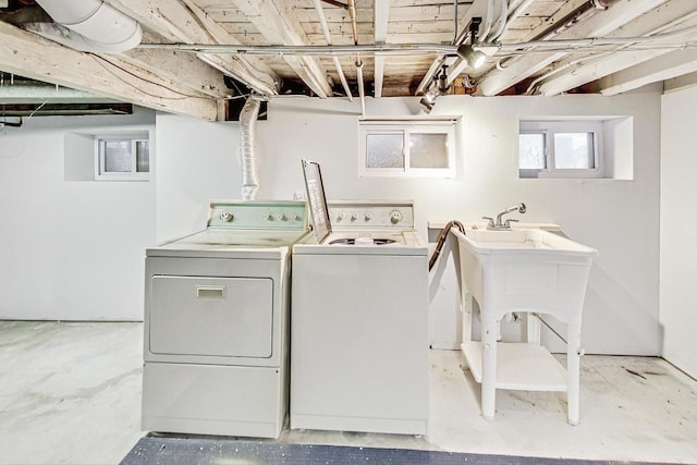 laundry room featuring separate washer and dryer