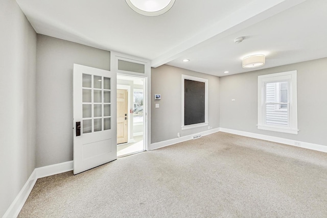 view of carpeted spare room