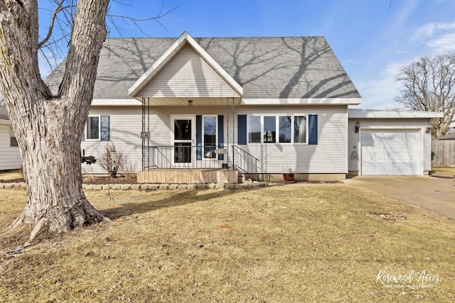 view of front of property with roof with shingles, covered porch, a garage, driveway, and a front lawn