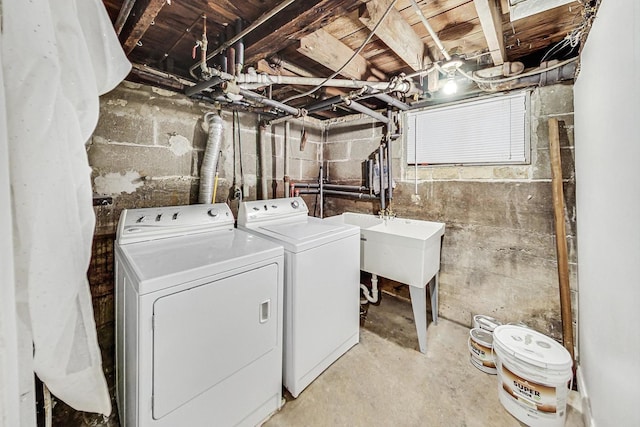 laundry room featuring washer and clothes dryer