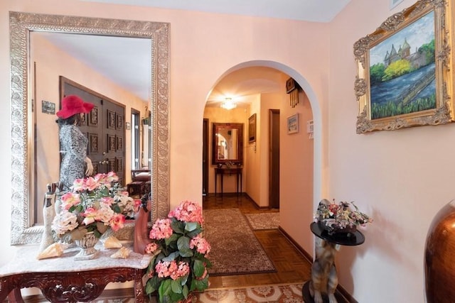 corridor with parquet flooring