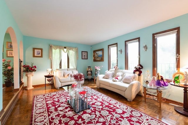 living room with dark parquet flooring