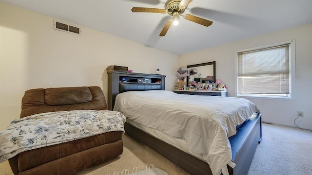 carpeted bedroom featuring ceiling fan