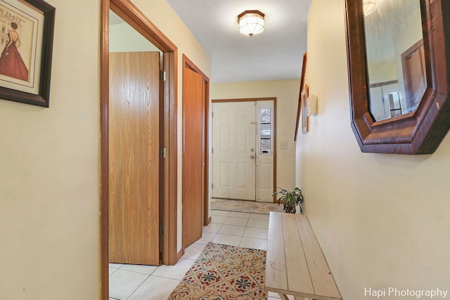 corridor with light tile patterned flooring