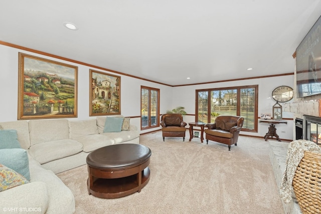 carpeted living room featuring ornamental molding