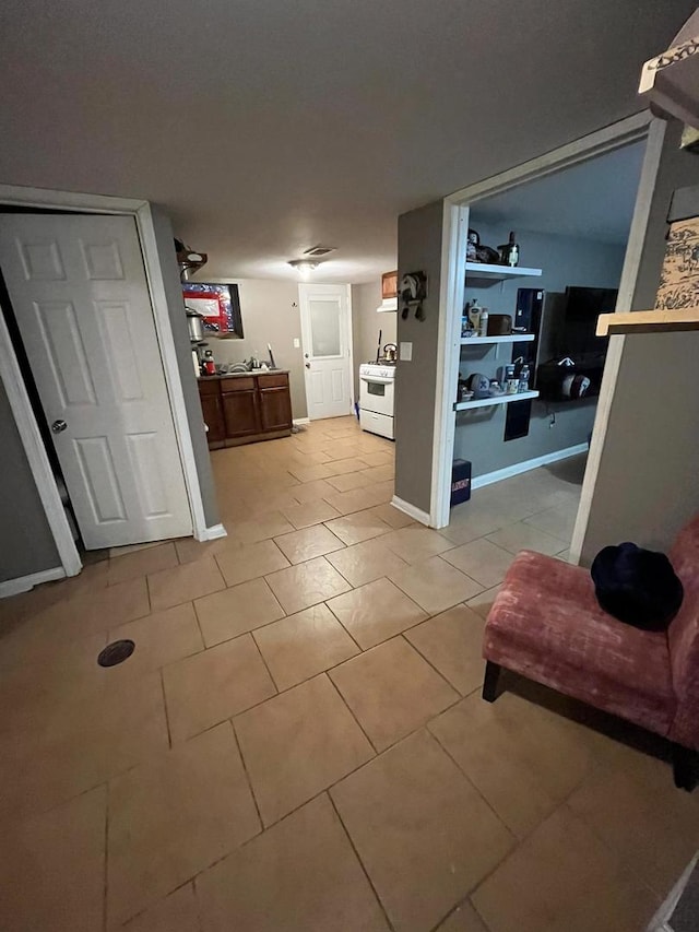 interior space featuring light tile patterned floors