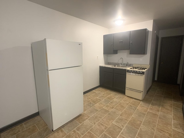 401 Robinson St, Danville, IL 61832 - kitchen featuring sink and white appliances