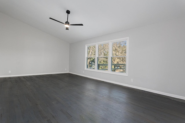 unfurnished room featuring ceiling fan, dark hardwood / wood-style flooring, and vaulted ceiling