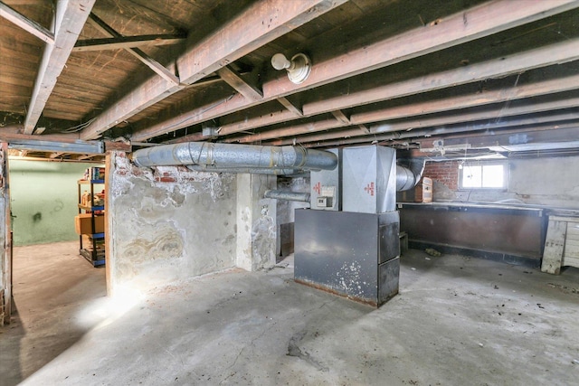 basement featuring heating unit