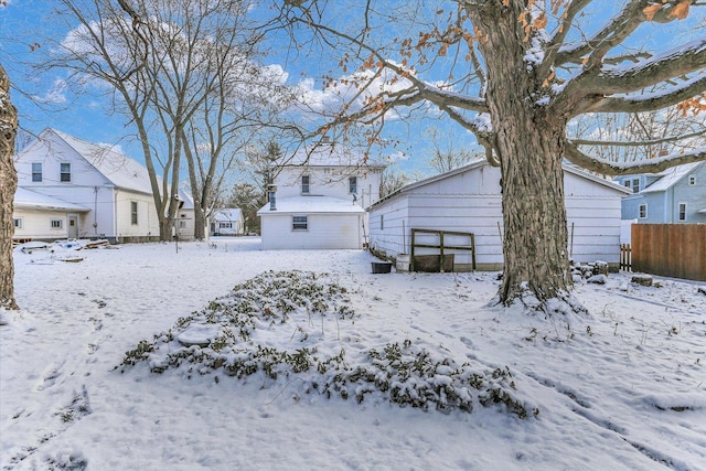 view of snow covered house