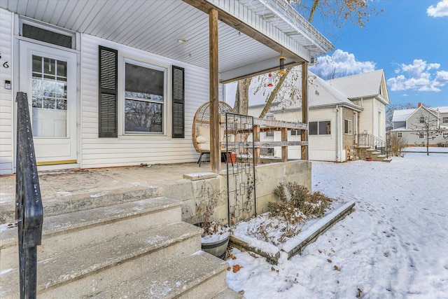 view of snow covered property