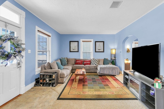 living room with a textured ceiling