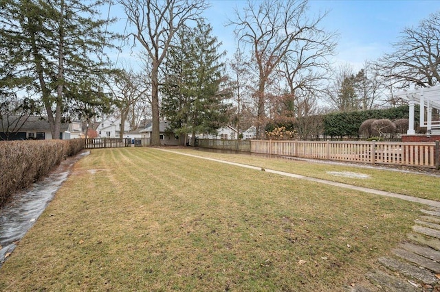 view of yard featuring fence