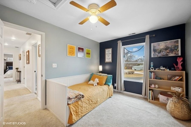 carpeted bedroom featuring ceiling fan