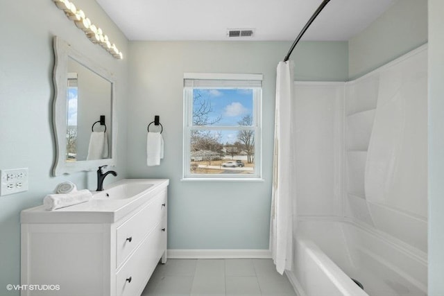 bathroom with shower / tub combo with curtain and vanity