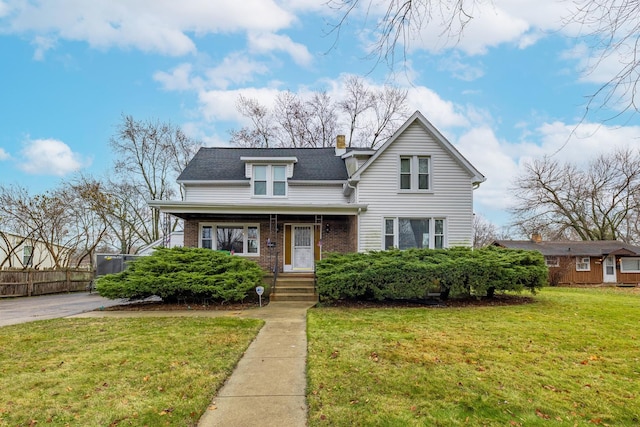 view of front of home with a front yard