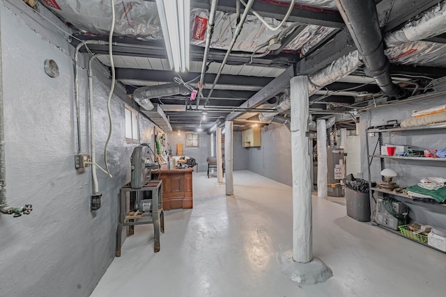 basement featuring gas water heater