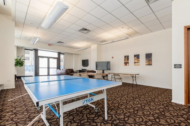 game room with french doors and carpet floors