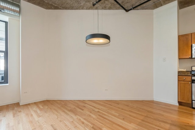 interior space with light hardwood / wood-style floors