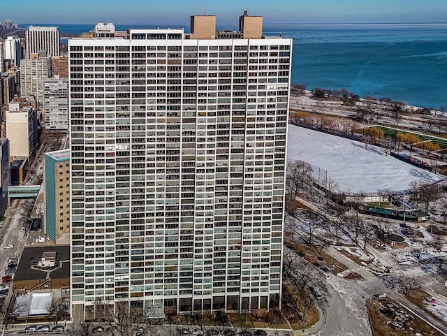 view of building exterior with a water view