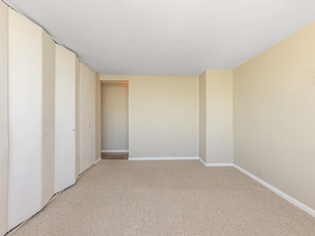 spare room with carpet floors