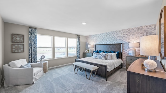 bedroom featuring light colored carpet