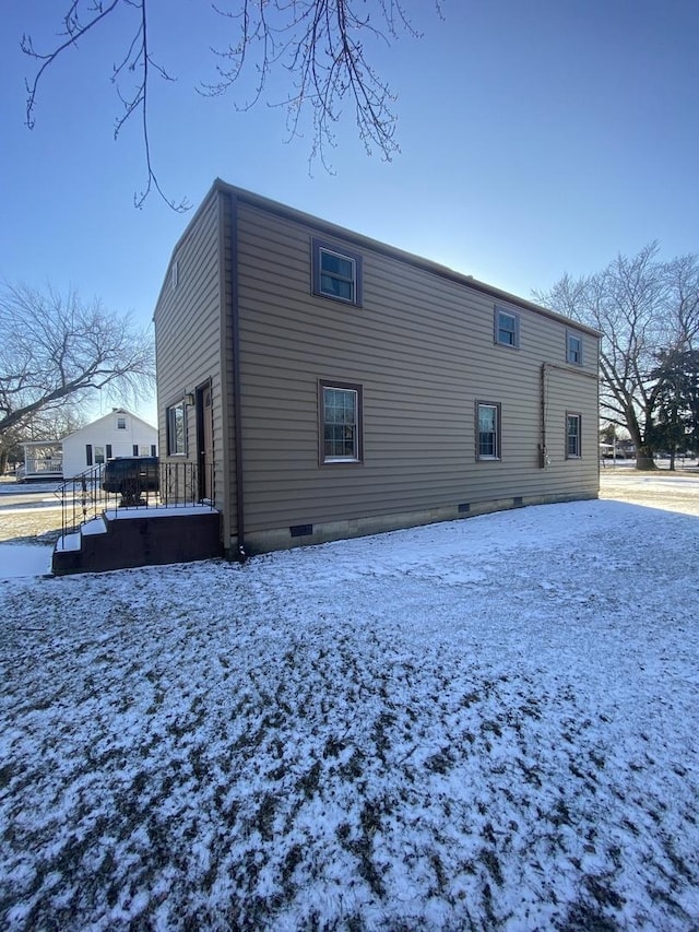 view of snow covered property