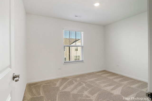 empty room with carpet floors