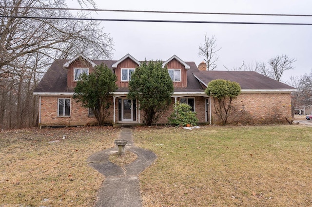 view of front of home with a front lawn