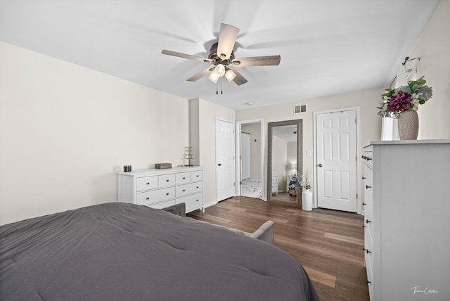 unfurnished bedroom with dark hardwood / wood-style floors and ceiling fan