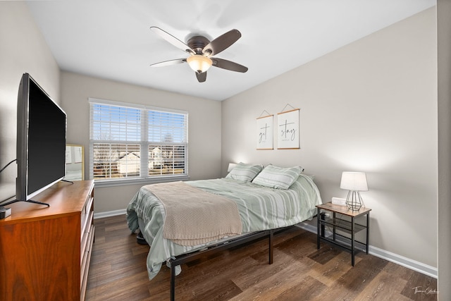 bedroom featuring dark wood-type flooring and ceiling fan