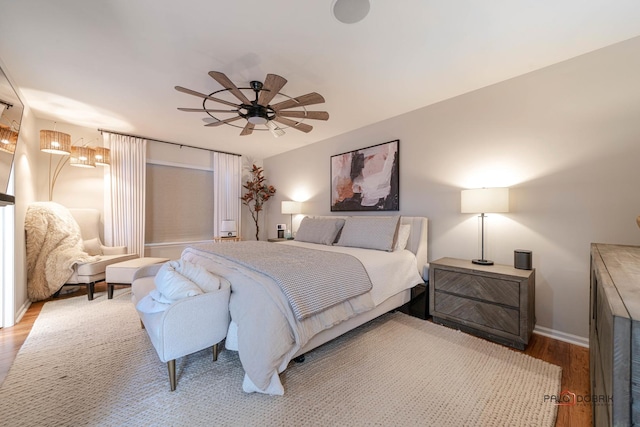 bedroom featuring ceiling fan and hardwood / wood-style floors