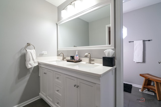 bathroom featuring vanity and tile patterned floors