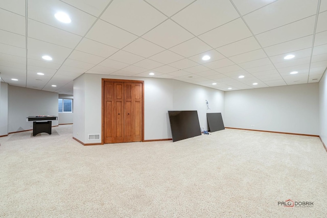 basement with light carpet