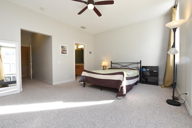 bedroom with ceiling fan and light carpet